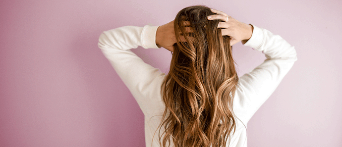 Postpartum Hair Loss: Is It Normal and Why Does It Happen?